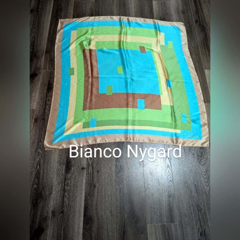- Bianco Nygard large scarf. Geometric pattern. 40x41 inches. Material is …